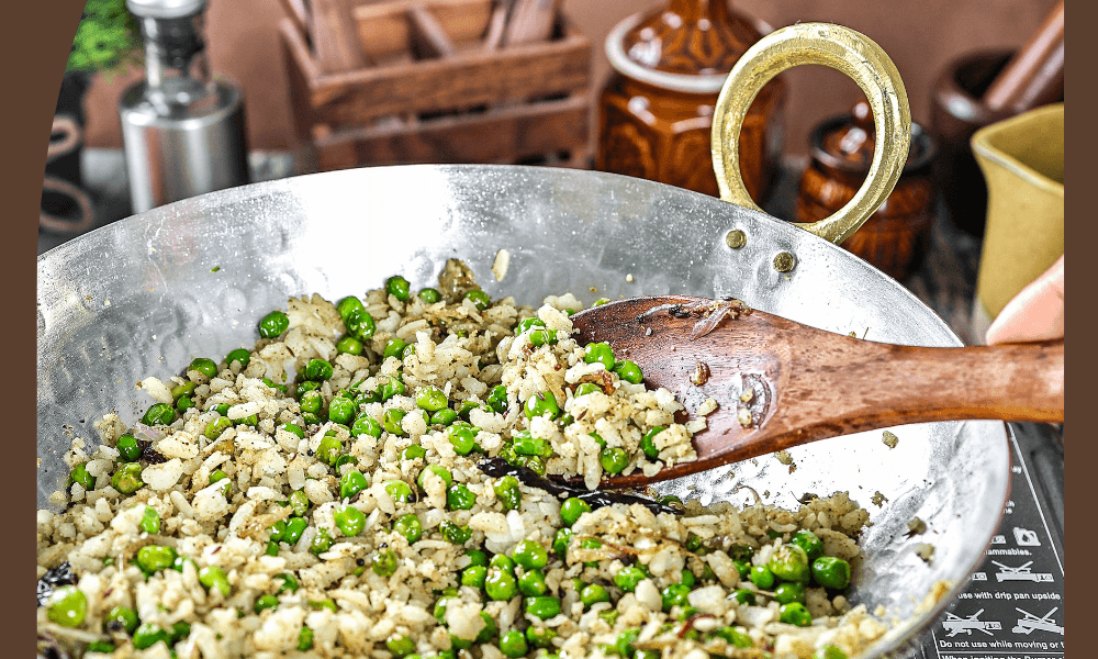 A bowl of Banarasi Chura Matar garnished with coriander and served hot