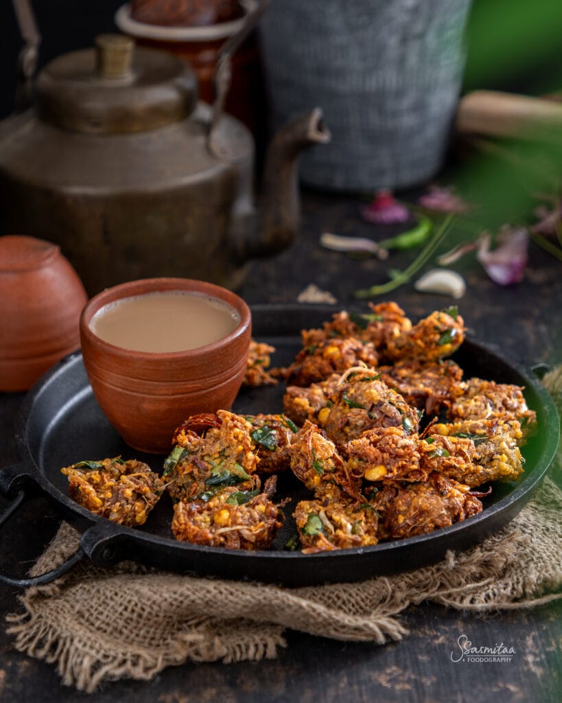 Close-up of crispy Raw Jackfruit Chana Dal Fritters made with tender raw jackfruit, chana dal, onions, and curry leaves.