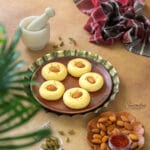 Soft homemade Chhena Peda garnished with almonds and saffron