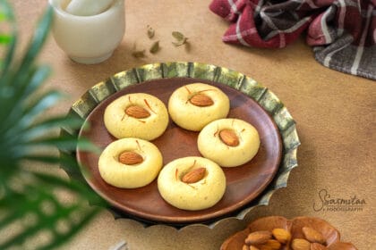 Soft homemade Chhena Peda garnished with almonds and saffron