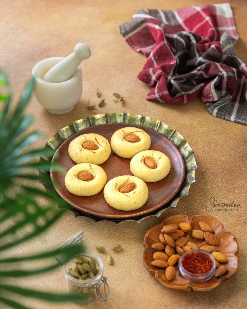 Soft homemade Chhena Peda garnished with almonds and saffron
