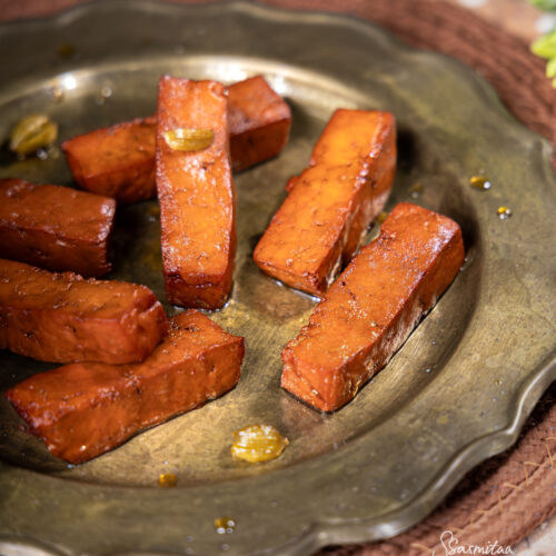 Close-up view of the texture and sugar coating of Chhena Muduki